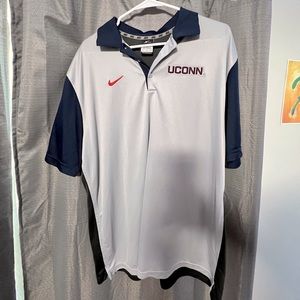 Blue and gray Nike Uconn polo shirt